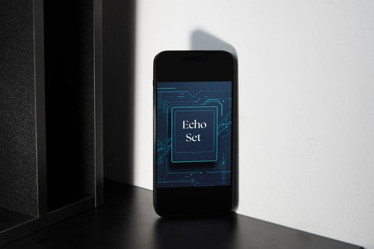 A black smartphone standing upright on a dark surface against a white wall, with its screen displaying the text 'Echo Set' over a blue circuit-board graphic.