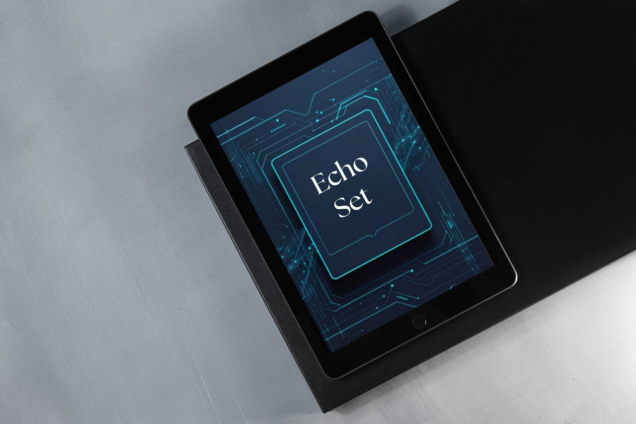 A black tablet device shown at an angle on a dark surface against a light gray background, with the screen displaying the text 'Echo Set' over a blue circuit-style graphic.